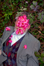 Cloistered Order detail-__A Shatter Of Camellia Blooms Arranged Themselves over Tom's Face__